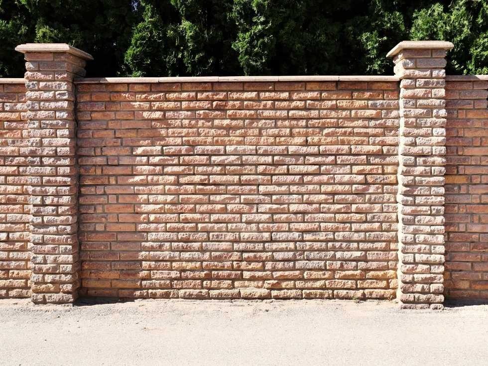 A neat brick boundary wall or suburban front fence
